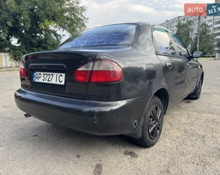 Черный Дэу Ланос, объемом двигателя 1.5 л и пробегом 274 тыс. км за 2250 $, фото 2 на Automoto.ua