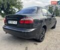 Черный Дэу Ланос, объемом двигателя 1.5 л и пробегом 274 тыс. км за 2250 $, фото 2 на Automoto.ua