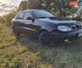 Чорний Деу Ланос, об'ємом двигуна 1.5 л та пробігом 221 тис. км за 2350 $, фото 1 на Automoto.ua