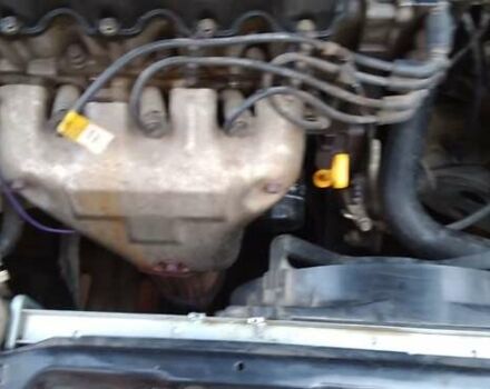 Черный Дэу Ланос, объемом двигателя 1.5 л и пробегом 156 тыс. км за 2000 $, фото 1 на Automoto.ua