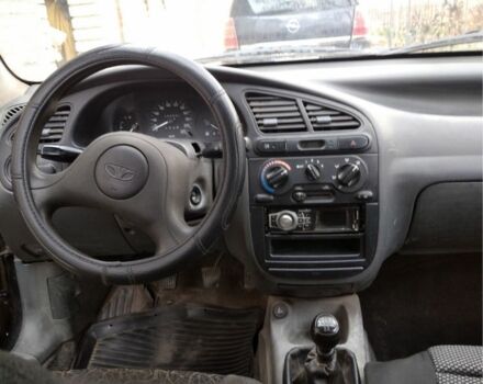 Черный Дэу Ланос, объемом двигателя 1.4 л и пробегом 1 тыс. км за 2000 $, фото 5 на Automoto.ua