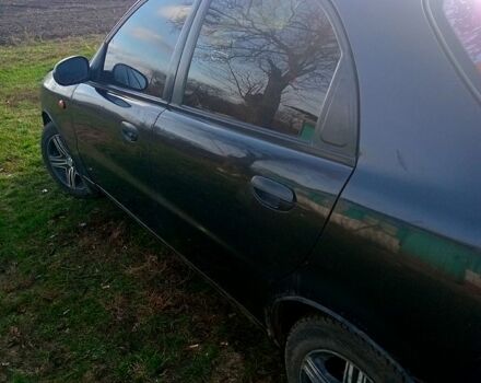 Черный Дэу Ланос, объемом двигателя 1.5 л и пробегом 286 тыс. км за 1000 $, фото 2 на Automoto.ua