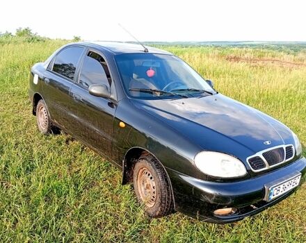 Черный Дэу Ланос, объемом двигателя 1.5 л и пробегом 230 тыс. км за 1500 $, фото 1 на Automoto.ua