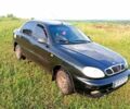 Черный Дэу Ланос, объемом двигателя 1.5 л и пробегом 230 тыс. км за 1500 $, фото 1 на Automoto.ua