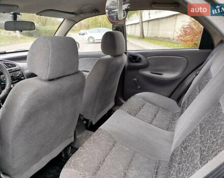 Черный Дэу Ланос, объемом двигателя 1.5 л и пробегом 350 тыс. км за 1800 $, фото 6 на Automoto.ua