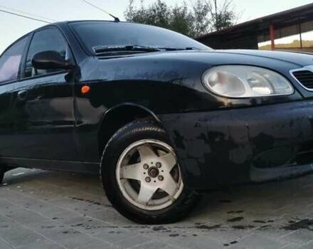 Черный Дэу Ланос, объемом двигателя 1.3 л и пробегом 160 тыс. км за 2000 $, фото 5 на Automoto.ua