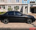 Чорний Деу Ланос, об'ємом двигуна 1.4 л та пробігом 252 тис. км за 1600 $, фото 6 на Automoto.ua