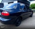 Черный Дэу Ланос, объемом двигателя 1.6 л и пробегом 300 тыс. км за 2800 $, фото 3 на Automoto.ua