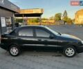 Чорний Деу Ланос, об'ємом двигуна 1.4 л та пробігом 257 тис. км за 1499 $, фото 1 на Automoto.ua