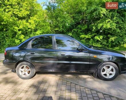 Черный Дэу Ланос, объемом двигателя 1.4 л и пробегом 165 тыс. км за 1450 $, фото 5 на Automoto.ua