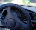 Черный Дэу Ланос, объемом двигателя 1.5 л и пробегом 174 тыс. км за 2100 $, фото 1 на Automoto.ua