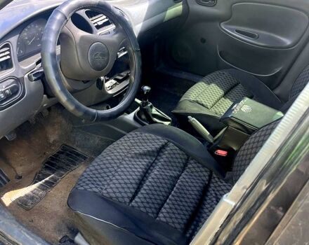 Дэу Ланос 2008 в Сумах на Automoto.ua Черный Дэу Ланос, объемом двигателя 1.4 л и пробегом 150 тыс. км за 1400 $, фото 9 на Automoto.ua