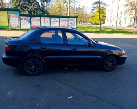 Черный Дэу Ланос, объемом двигателя 1.5 л и пробегом 365 тыс. км за 2000 $, фото 3 на Automoto.ua