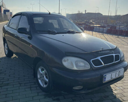 Черный Дэу Ланос, объемом двигателя 1.4 л и пробегом 177 тыс. км за 1750 $, фото 1 на Automoto.ua