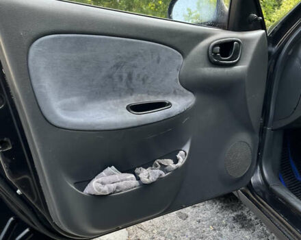 Черный Дэу Ланос, объемом двигателя 1.5 л и пробегом 300 тыс. км за 2400 $, фото 17 на Automoto.ua