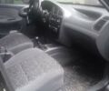 Черный Дэу Ланос, объемом двигателя 1.5 л и пробегом 197 тыс. км за 2300 $, фото 4 на Automoto.ua