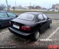 Черный Дэу Ланос, объемом двигателя 1.5 л и пробегом 220 тыс. км за 1000 $, фото 3 на Automoto.ua