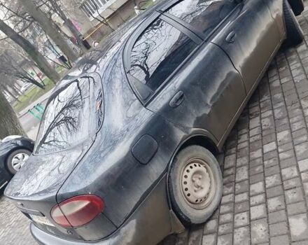 Чорний Деу Ланос, об'ємом двигуна 1.39 л та пробігом 320 тис. км за 1500 $, фото 6 на Automoto.ua