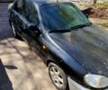 Чорний Деу Ланос, об'ємом двигуна 1.5 л та пробігом 0 тис. км за 950 $, фото 1 на Automoto.ua