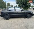 Черный Дэу Ланос, объемом двигателя 1.5 л и пробегом 274 тыс. км за 2250 $, фото 1 на Automoto.ua