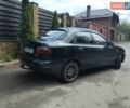 Черный Дэу Ланос, объемом двигателя 1.5 л и пробегом 170 тыс. км за 2800 $, фото 4 на Automoto.ua