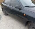 Черный Дэу Ланос, объемом двигателя 1.5 л и пробегом 250 тыс. км за 1700 $, фото 5 на Automoto.ua