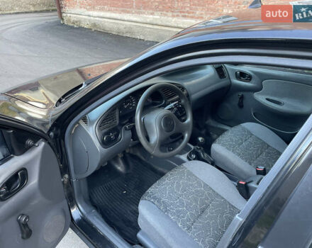 Черный Дэу Ланос, объемом двигателя 1.4 л и пробегом 233 тыс. км за 2500 $, фото 23 на Automoto.ua