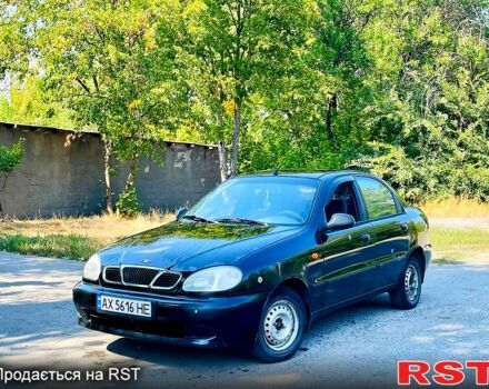 Черный Дэу Ланос, объемом двигателя 1.4 л и пробегом 303 тыс. км за 1199 $, фото 2 на Automoto.ua