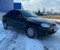 Чорний Деу Ланос, об'ємом двигуна 1.5 л та пробігом 231 тис. км за 2299 $, фото 1 на Automoto.ua