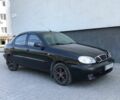 Чорний Деу Ланос, об'ємом двигуна 1.5 л та пробігом 259 тис. км за 2100 $, фото 1 на Automoto.ua