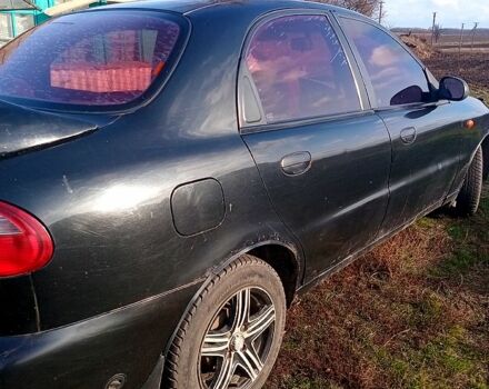 Черный Дэу Ланос, объемом двигателя 1.5 л и пробегом 286 тыс. км за 1000 $, фото 4 на Automoto.ua