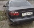 Черный Дэу Ланос, объемом двигателя 1.5 л и пробегом 160 тыс. км за 540 $, фото 1 на Automoto.ua