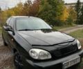 Черный Дэу Ланос, объемом двигателя 1.5 л и пробегом 270 тыс. км за 1900 $, фото 1 на Automoto.ua