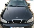 Черный Дэу Ланос, объемом двигателя 1.5 л и пробегом 200 тыс. км за 3300 $, фото 1 на Automoto.ua