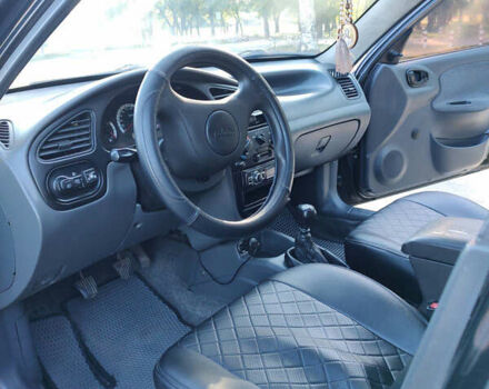 Черный Дэу Ланос, объемом двигателя 1.5 л и пробегом 160 тыс. км за 2500 $, фото 6 на Automoto.ua