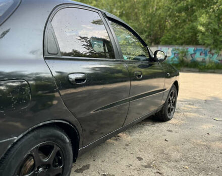 Черный Дэу Ланос, объемом двигателя 1.5 л и пробегом 300 тыс. км за 2400 $, фото 20 на Automoto.ua