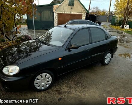 Черный Дэу Ланос, объемом двигателя 1.4 л и пробегом 220 тыс. км за 1800 $, фото 8 на Automoto.ua