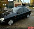 Черный Дэу Ланос, объемом двигателя 1.4 л и пробегом 220 тыс. км за 1800 $, фото 8 на Automoto.ua