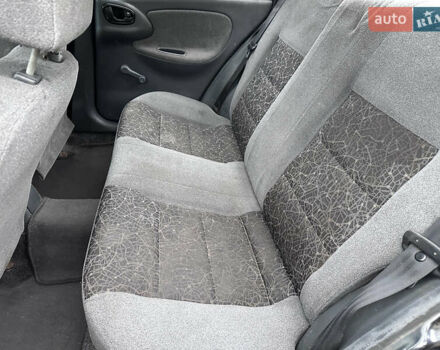 Черный Дэу Ланос, объемом двигателя 1.5 л и пробегом 267 тыс. км за 1499 $, фото 8 на Automoto.ua