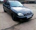 Чорний Деу Ланос, об'ємом двигуна 1.6 л та пробігом 230 тис. км за 1400 $, фото 1 на Automoto.ua