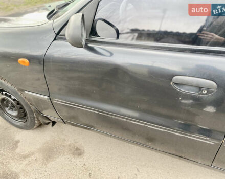 Дэу Ланос 2008 в Дубно на Automoto.ua Черный Дэу Ланос, объемом двигателя 1.4 л и пробегом 180 тыс. км за 1800 $, фото 13 на Automoto.ua