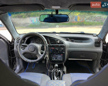 Черный Дэу Ланос, объемом двигателя 1.5 л и пробегом 300 тыс. км за 2400 $, фото 8 на Automoto.ua