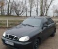 Чорний Деу Ланос, об'ємом двигуна 1.5 л та пробігом 164 тис. км за 3000 $, фото 1 на Automoto.ua