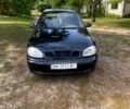 Чорний Деу Ланос, об'ємом двигуна 1.6 л та пробігом 158 тис. км за 1380 $, фото 1 на Automoto.ua