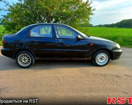 Черный Дэу Ланос, объемом двигателя 1.5 л и пробегом 368 тыс. км за 1150 $, фото 3 на Automoto.ua