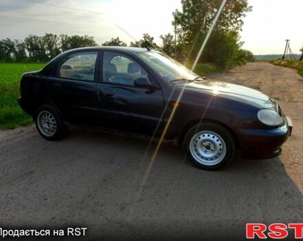 Черный Дэу Ланос, объемом двигателя 1.5 л и пробегом 368 тыс. км за 1150 $, фото 2 на Automoto.ua
