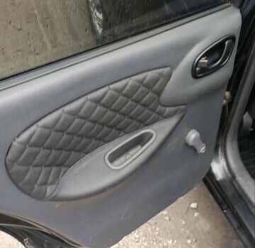 Чорний Деу Ланос, об'ємом двигуна 1.5 л та пробігом 190 тис. км за 2500 $, фото 3 на Automoto.ua