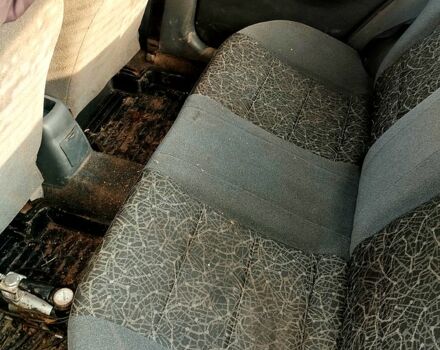 Черный Дэу Ланос, объемом двигателя 1.5 л и пробегом 140 тыс. км за 1100 $, фото 3 на Automoto.ua