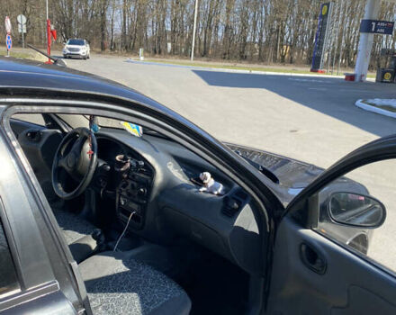 Дэу Ланос 2008 в Жидачов на Automoto.ua Черный Дэу Ланос, объемом двигателя 1.5 л и пробегом 204 тыс. км за 2000 $, фото 4 на Automoto.ua