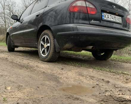 Черный Дэу Ланос, объемом двигателя 1.5 л и пробегом 119 тыс. км за 2590 $, фото 2 на Automoto.ua